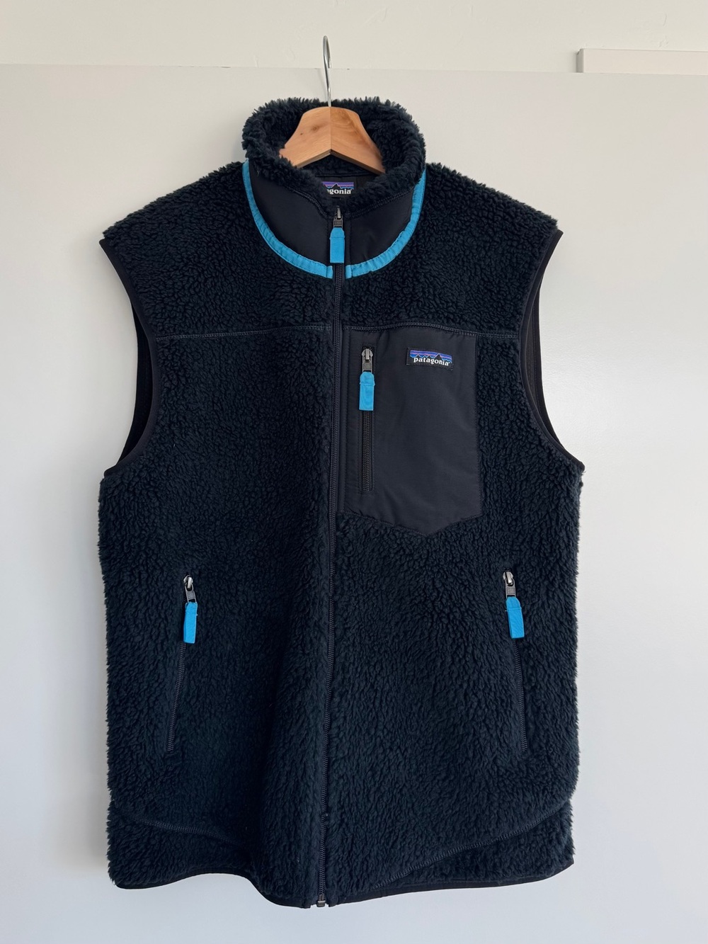 Patagonia Black Sherpa Vest with Blue Trim